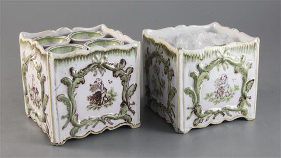 A pair of French faience bough pots and covers, 19th century, height 5in.